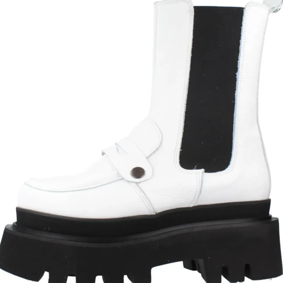 Botas Chelsea elegantes con detalle de adorno