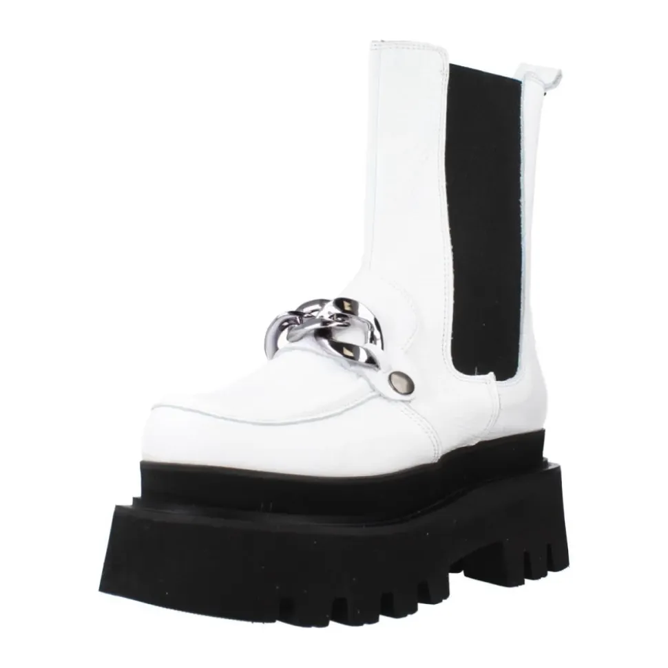Botas Chelsea elegantes con detalle de adorno