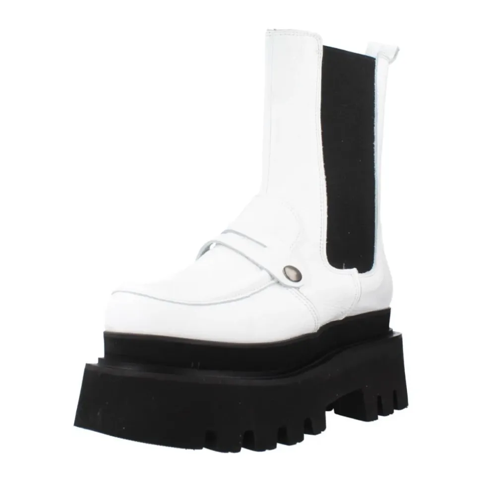 Botas Chelsea elegantes con detalle de adorno