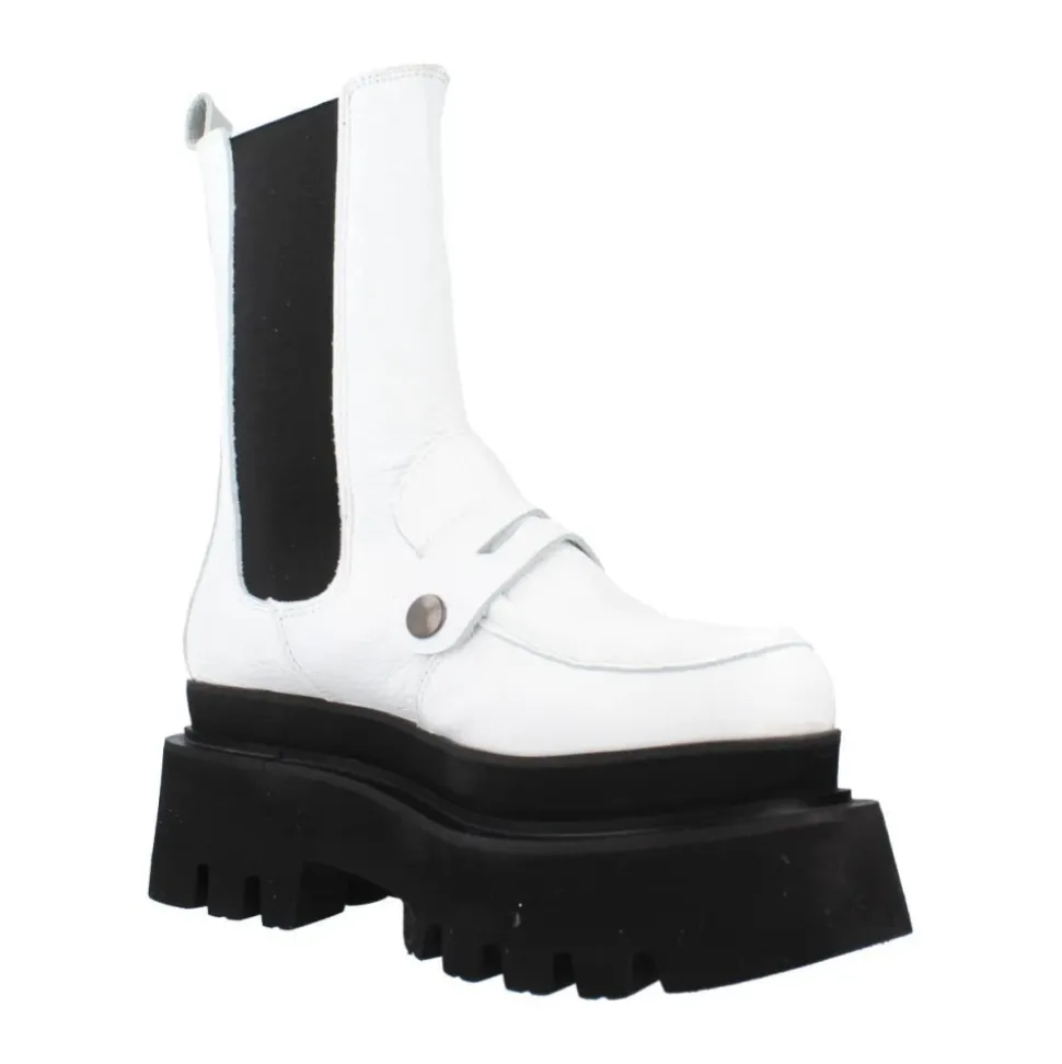 Botas Chelsea elegantes con detalle de adorno