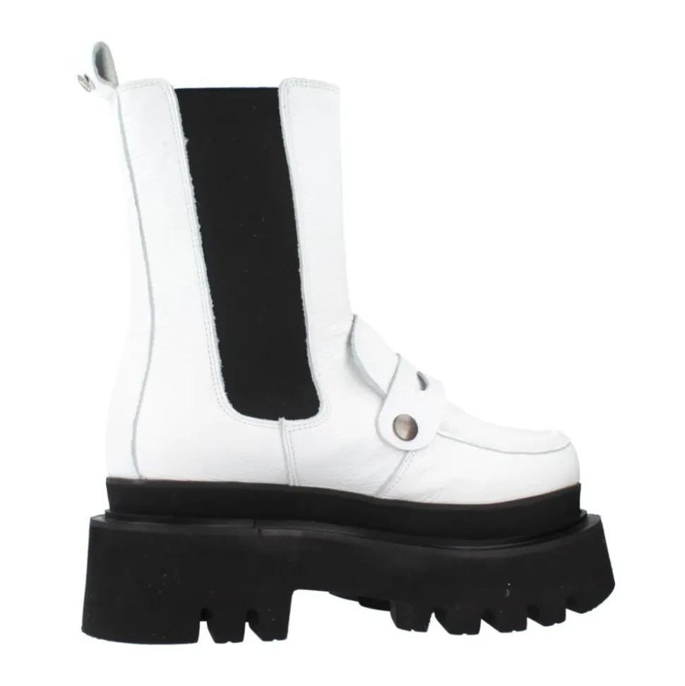 Botas Chelsea elegantes con detalle de adorno