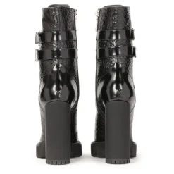 Botas de tacón alto con caña alta.Este producto tallaje pequeño.
