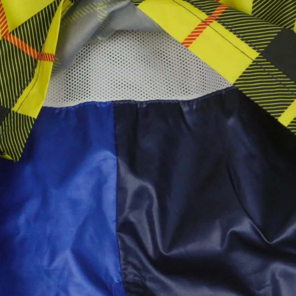 Cazadora cortavientos azul