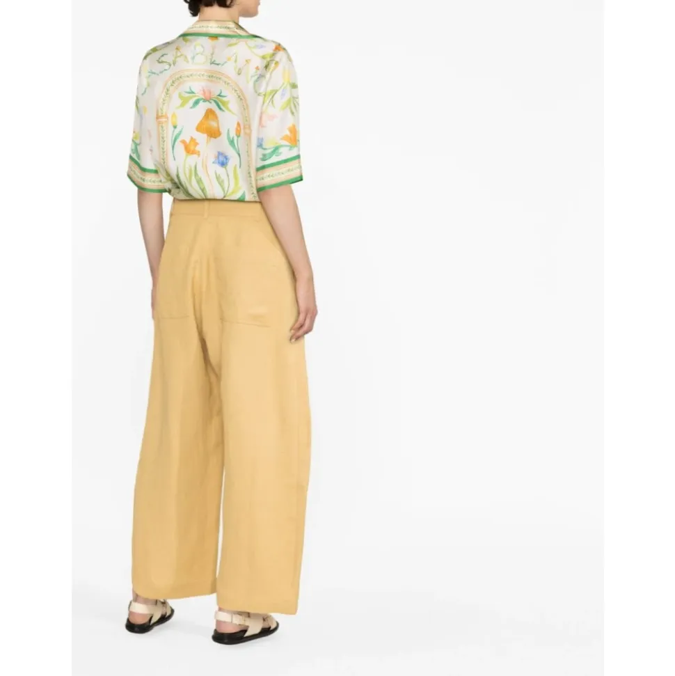 Pantalones anchos de lino amarillo de talle alto