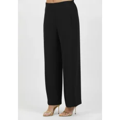 Pantalones fluidos de cady elástico