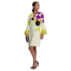Vestido amarillo de lunares con plumas