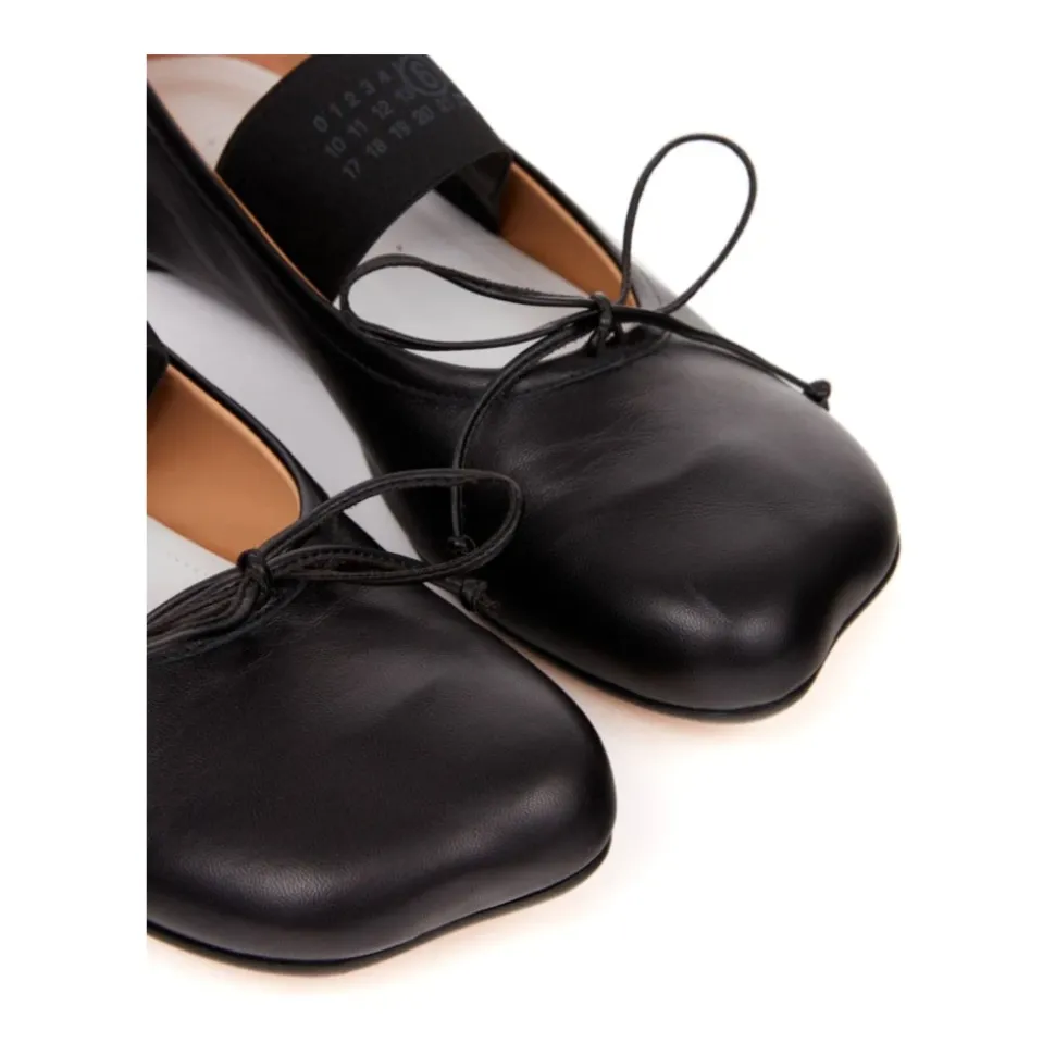 Zapatos planos con lazo de cuero